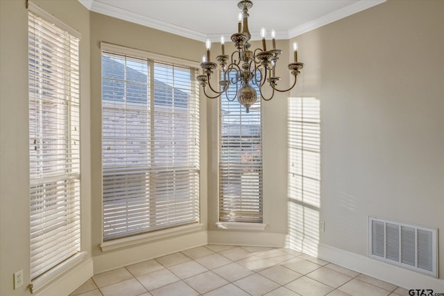 unfurnished dining area with light tile patterned flooring, visible vents, crown molding, and an inviting chandelier