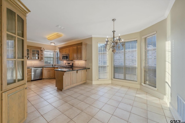 kitchen featuring light tile patterned floors, stainless steel appliances, visible vents, hanging light fixtures, and glass insert cabinets