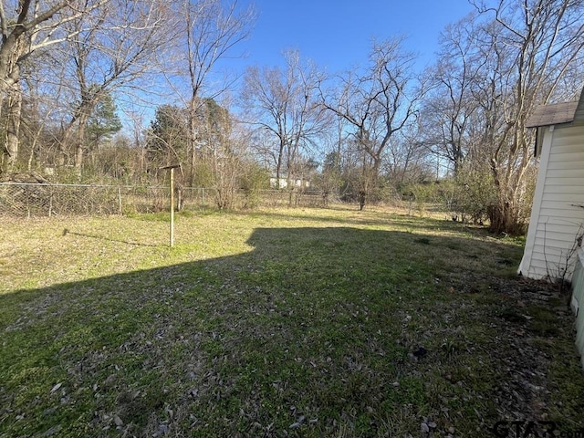 view of yard featuring fence