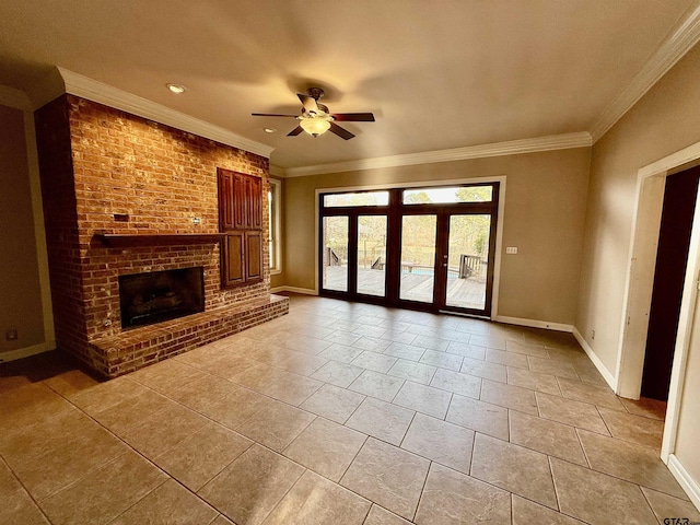 unfurnished living room featuring crown molding, a brick fireplace, light tile patterned floors, and ceiling fan