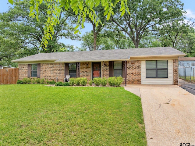 single story home featuring brick siding and concrete driveway