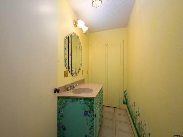19543 Meadowood Ln, Tyler, TX 75703 - bathroom with vanity and a textured ceiling