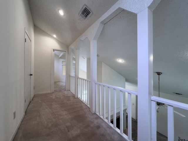 19543 Meadowood Ln, Tyler, TX 75703 - hall featuring carpet flooring, recessed lighting, vaulted ceiling, and baseboards