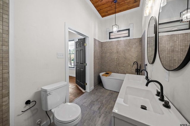 1314 N Queen St, Palestine, TX 75803 - full bath with wood ceiling, wood finished floors, a sink, and double vanity