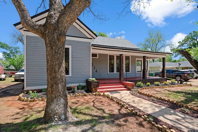 1314 N Queen St, Palestine, TX 75803 - view of front facade with covered porch
