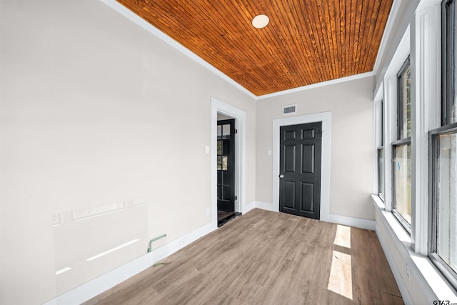 1314 N Queen St, Palestine, TX 75803 - entryway featuring plenty of natural light, visible vents, wooden ceiling, and ornamental molding