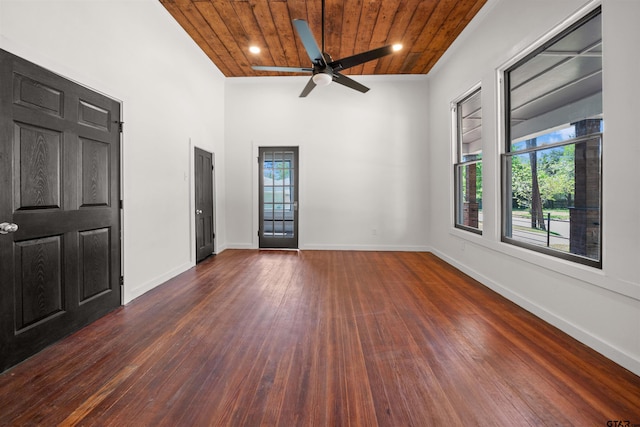1314 N Queen St, Palestine, TX 75803 - empty room featuring plenty of natural light, dark wood-type flooring, wooden ceiling, and ceiling fan