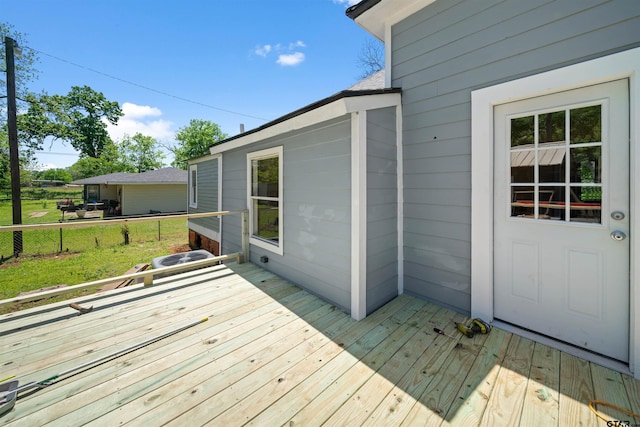 1314 N Queen St, Palestine, TX 75803 - wooden terrace with a lawn