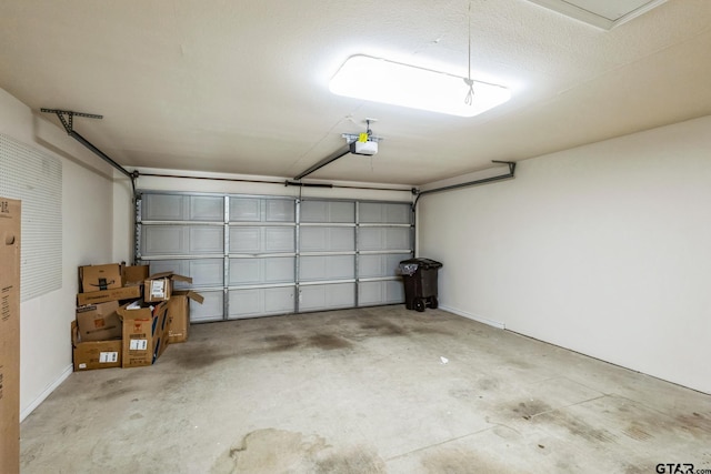 5401 Hollytree Dr, Tyler, TX 75703 - garage featuring a garage door opener