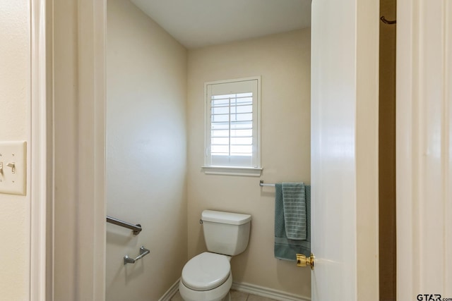 5401 Hollytree Dr, Tyler, TX 75703 - bathroom with toilet and baseboards