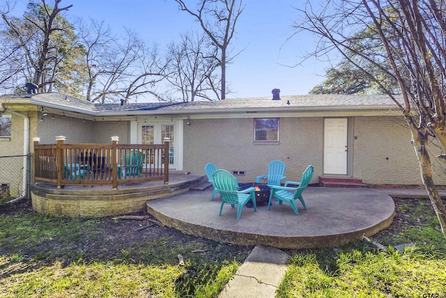 rear view of property featuring a patio