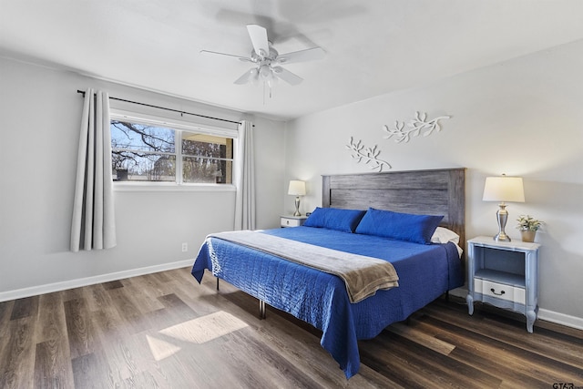 bedroom with dark wood-type flooring and ceiling fan