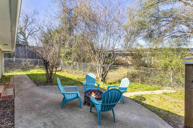 view of patio / terrace featuring a fire pit