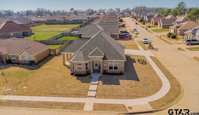 drone / aerial view with a residential view