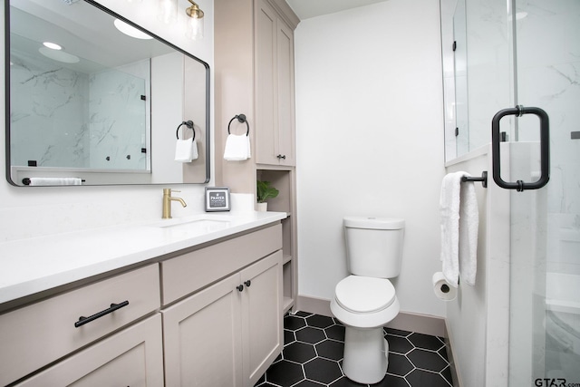 bathroom with walk in shower, vanity, and toilet