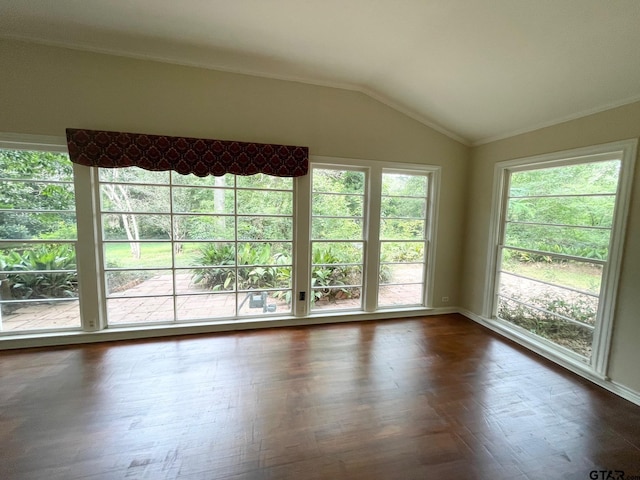 1106 E Redbud, Crockett, TX 75835 - empty room featuring vaulted ceiling and crown molding