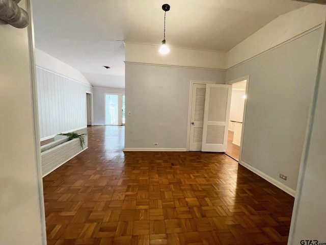 1106 E Redbud, Crockett, TX 75835 - unfurnished room featuring vaulted ceiling and baseboards