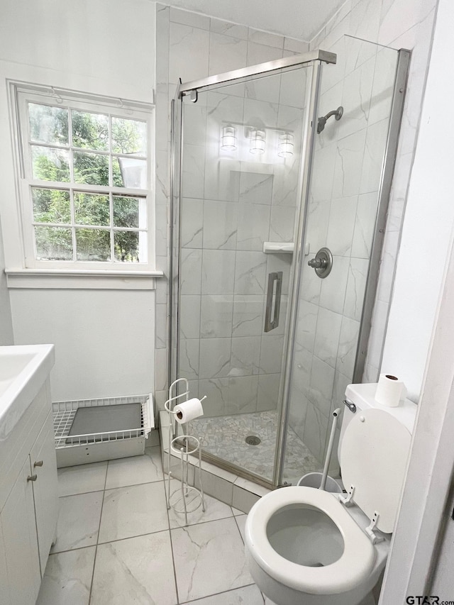 1106 E Redbud, Crockett, TX 75835 - full bathroom featuring marble finish floors, a shower stall, and vanity
