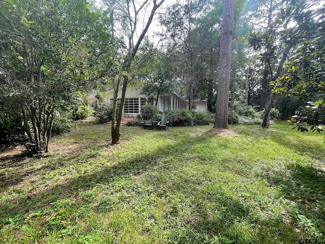 1106 E Redbud, Crockett, TX 75835 - view of grassy yard