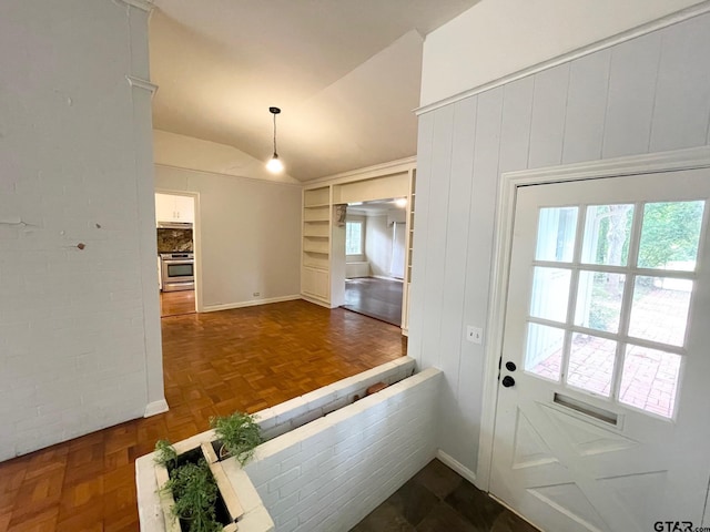 1106 E Redbud, Crockett, TX 75835 - entrance foyer featuring lofted ceiling and baseboards