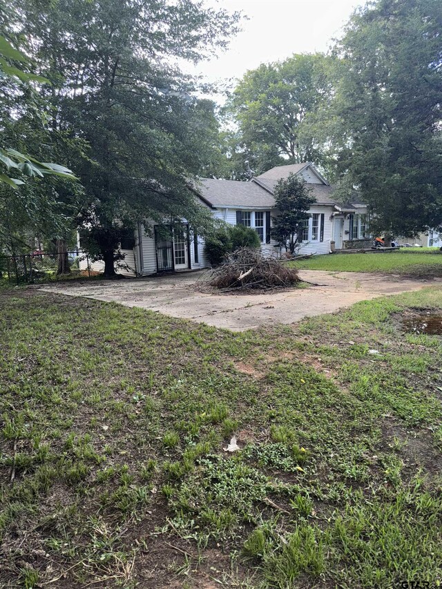 107 Acorn Dr, Marshall, TX 75670 - view of front of house featuring a front lawn