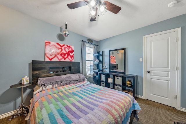 carpeted bedroom featuring ceiling fan