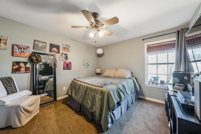 carpeted bedroom featuring ceiling fan