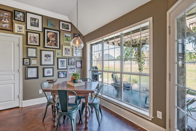 dining area with lofted ceiling