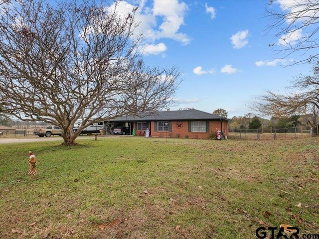 ranch-style home featuring a front yard