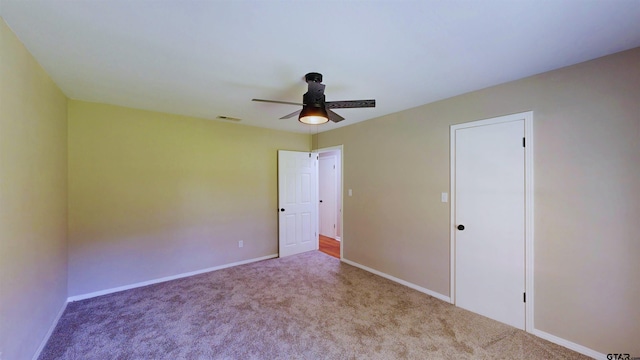 15269 County Road 1227, Flint, TX 75762 - unfurnished bedroom featuring carpet floors and a ceiling fan