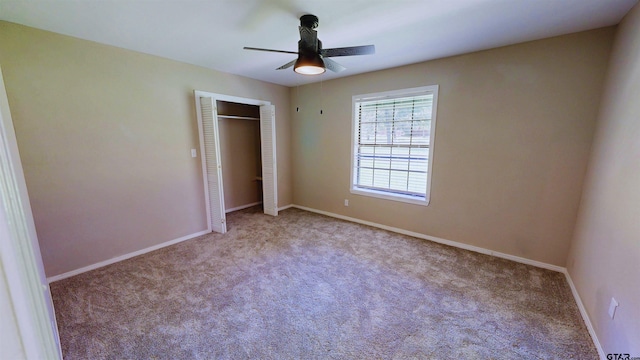 15269 County Road 1227, Flint, TX 75762 - unfurnished bedroom featuring carpet flooring, a closet, and ceiling fan