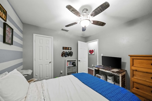 bedroom with visible vents and ceiling fan