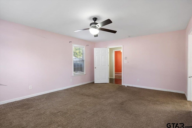 unfurnished bedroom with ceiling fan and carpet flooring