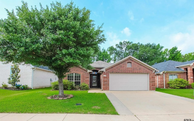 2559 Lazy Acres Ln, Tyler, TX 75707 - view of front facade featuring an attached garage, brick siding, driveway, and a front yard