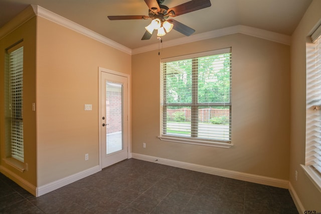 2559 Lazy Acres Ln, Tyler, TX 75707 - spare room with ceiling fan, baseboards, ornamental molding, and dark tile patterned floors