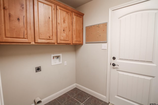 2559 Lazy Acres Ln, Tyler, TX 75707 - laundry room featuring electric dryer hookup, cabinet space, hookup for a washing machine, baseboards, and dark tile patterned floors
