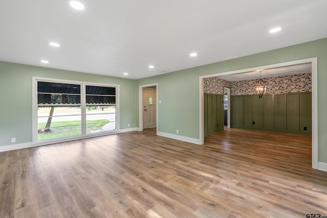 unfurnished room featuring light wood-type flooring