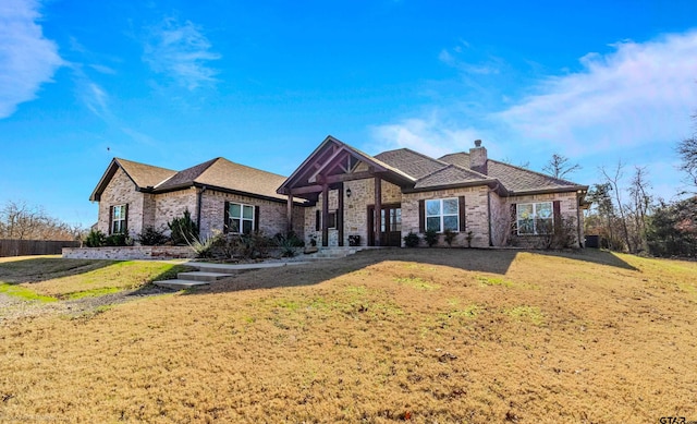 view of front of house with a front lawn