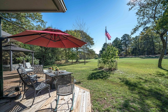 view of yard with a gazebo, an outdoor living space, and a wooden deck