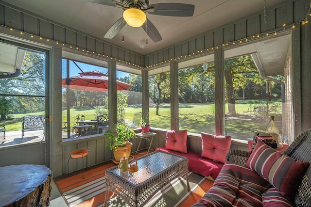 256 Ox Bow Cv, Holly Lake Ranch, TX 75765 - sunroom with golf course view, a ceiling fan, and an outdoor hangout area