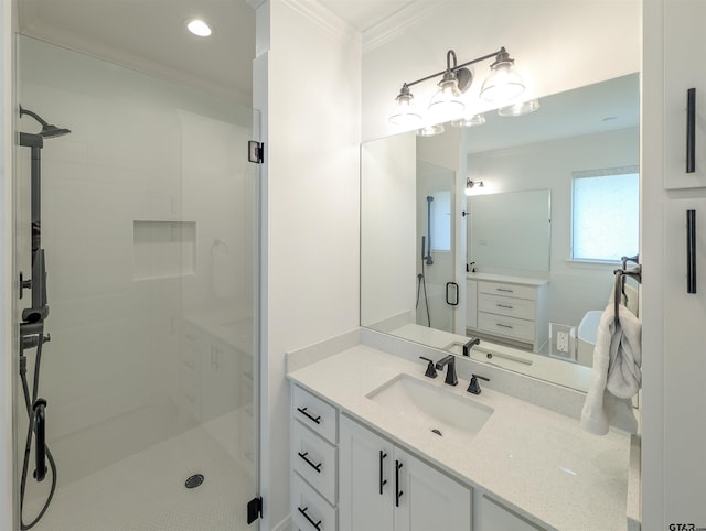 9070 Shallow Cv, Tyler, TX 75703 - bathroom with crown molding, a shower stall, vanity, and recessed lighting