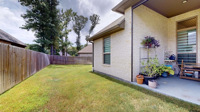 9070 Shallow Cv, Tyler, TX 75703 - fenced backyard with a patio