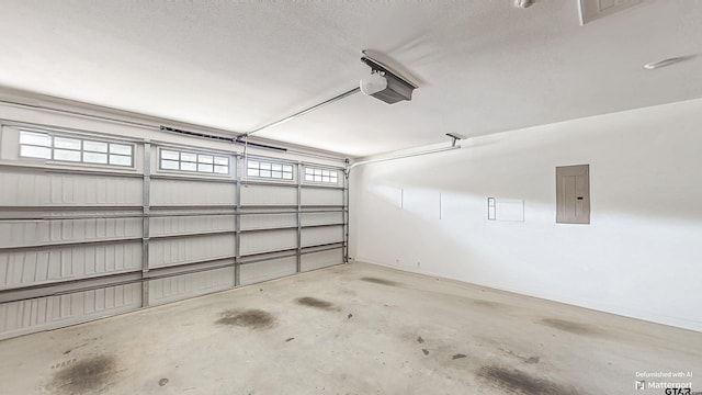 9070 Shallow Cv, Tyler, TX 75703 - garage featuring electric panel and a garage door opener