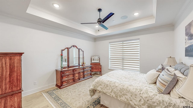 9070 Shallow Cv, Tyler, TX 75703 - bedroom featuring a raised ceiling, crown molding, light wood-style flooring, recessed lighting, and ceiling fan