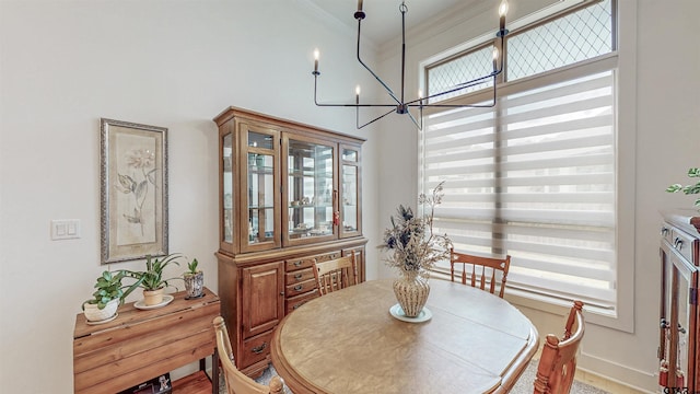 9070 Shallow Cv, Tyler, TX 75703 - dining space featuring a chandelier and crown molding