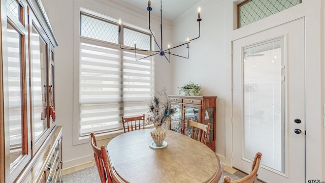 9070 Shallow Cv, Tyler, TX 75703 - dining space featuring a chandelier and ornamental molding