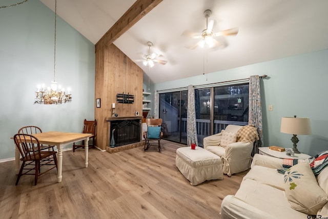 living room with beam ceiling, built in features, high vaulted ceiling, light hardwood / wood-style floors, and ceiling fan with notable chandelier