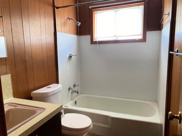 full bath with vanity, shower / tub combination, and toilet