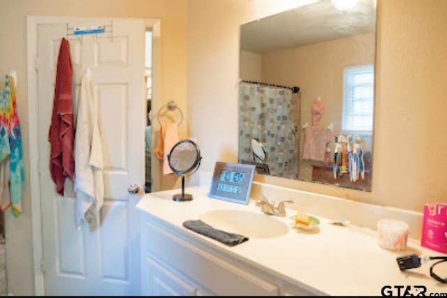 209 Kildare Rd, Linden, TX 75563 - full bathroom with vanity and a shower with shower curtain