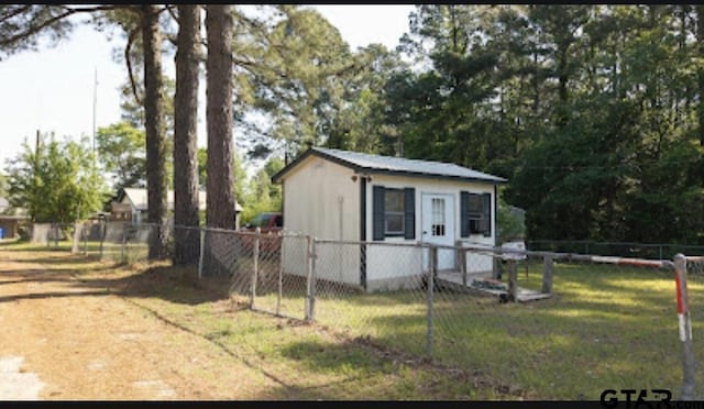 209 Kildare Rd, Linden, TX 75563 - view of outbuilding featuring fence and an outbuilding